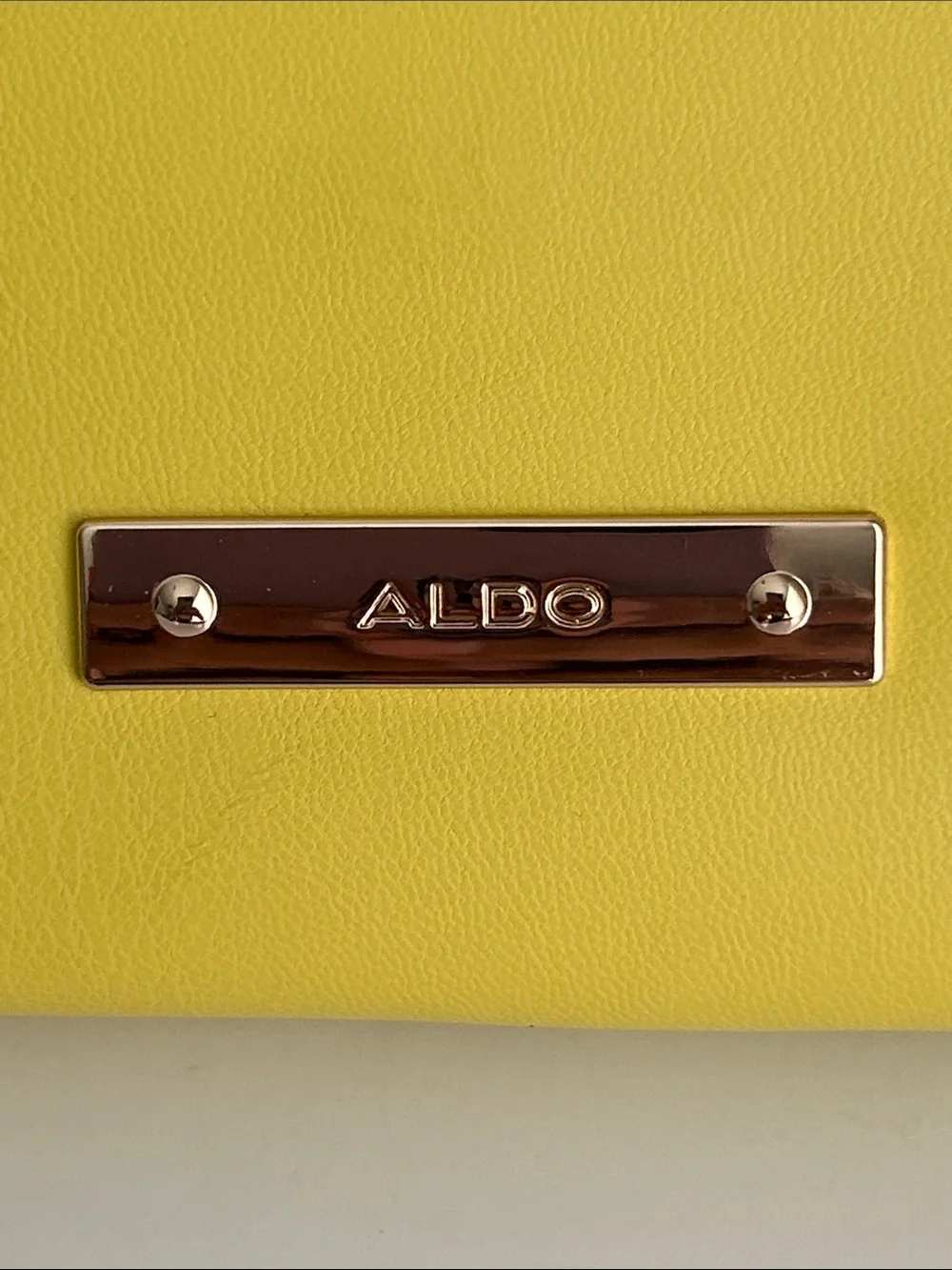 Aldo compact clutch